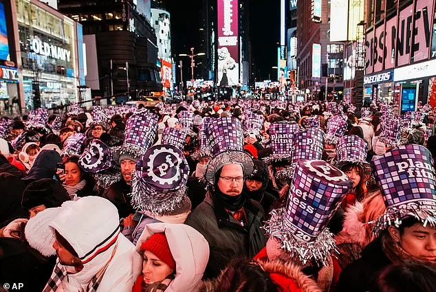 Frosted Festivities: Thousands Gather in Times Square for Chilling New Year’s Eve Celebration Amid Cold Snap