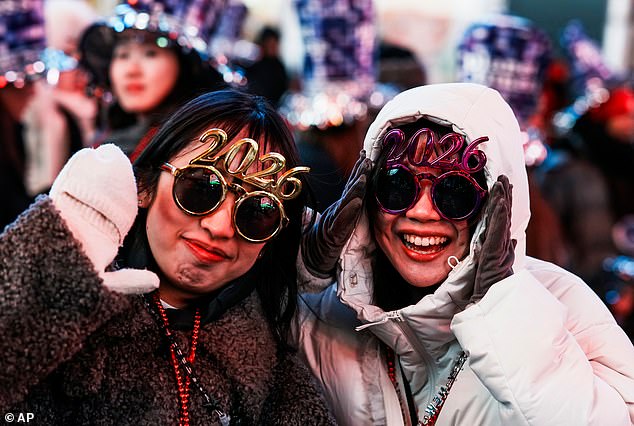 Frosted Festivities: Thousands Gather in Times Square for Chilling New Year’s Eve Celebration Amid Cold Snap